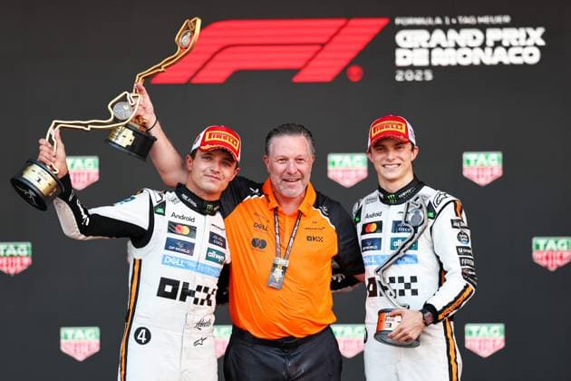 (250526) -- MONTE-CARLO, May 26, 2025 -- First-placed McLaren s driver Lando Norris (L) of Britain stands on the podium with third-placed Oscar Piastri (R) of Australia and McLaren CEO Zak Brown after the Formula One Monaco Grand Prix at Circuit de Monaco in Monte Carlo, Monaco, May 25, 2025. (Photo by Xinhua) (SP)MONACO-MONTE CARLO-AUTO-F1 GRAND PRIX QianxJun 