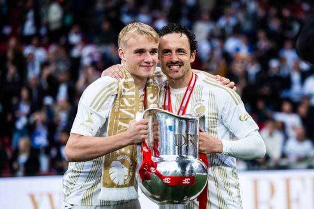 FC Copenhagen v FC Nordsjaelland, 3F Superliga football, Copenhagen, Denmark Copenhagen, Denmark. 25th, May 2025. Victor Froholdt (L) and Thomas Delaney (R) of FC Copenhagen seen in championship celebration after the 3F Superliga match between FC Copenhagen and FC Nordsjaelland at Parken in Copenhagen. Denmark, Copenhagen  Copyright: xGonzalesxPhoto DejanxObretkovicx