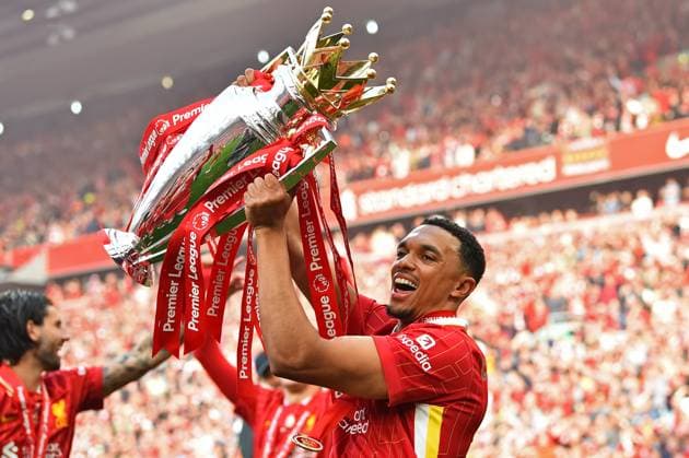 Liverpool, England, 25th May 2025. Trent Alexander-Arnold of Liverpooll lifts up the Premier League Trophy during the Liverpool vs Crystal Palace Premier League match at Anfield, Liverpool. Picture credit should read: Sportimage EDITORIAL USE ONLY. No use with unauthorised audio, video, data, fixture lists, club league logos or live services. Online in-match use limited to 120 images, no video emulation. No use in betting, games or single club league player publications. SPI_051_Liverpool_Palace SPI-3960-0134