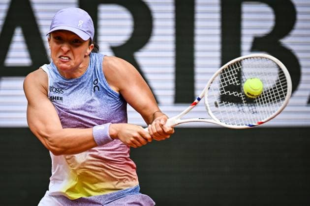 May 26, 2025, Paris, France, France: IGA SWIATEK of Poland in action against R. Sramkova of Slovakia during the second day of Roland-Garros 2025, French Open 2025, Grand Slam tennis tournament at Roland-Garros Stadium in Paris, France. Swiatek won 6:3, 6:3. Paris France - ZUMAm308 20250526_zsp_m308_016 Copyright: xMatthieuxMirvillex