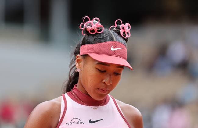 Naomi Osaka of Japan plays against Paula Badosa of Italy during their first-round match at the French Tennis Open in Roland Garros in Paris, France, on Monday, May 26, 2025. Badosa won 6-7, 6-1, 6-4.  PAR20250526109 MAYAxVIDON-WHITE