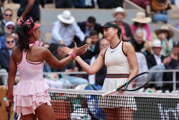 Naomi Osaka of Japan (L) shakes hands with Paula Badosa of Italy during their first-round match at the French Tennis Open in Roland Garros in Paris, France, on Monday, May 26, 2025. Badosa won 6-7, 6-1, 6-4.  PAR20250526117 MAYAxVIDON-WHITE