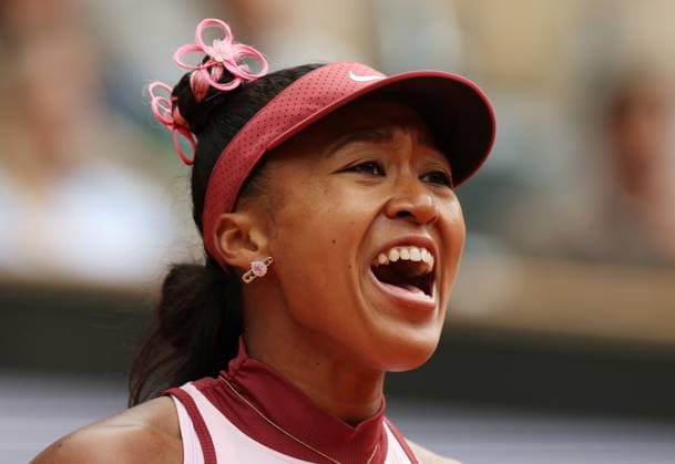 (250527) -- PARIS, May 27, 2025 -- Osaka Naomi reacts during the women s singles first round match between Osaka Naomi of Japan and Paula Badosa of Spain at the French Open tennis tournament at Roland Garros, Paris, France, May 26, 2025. ) (SP)FRANCE-PARIS-TENNIS-FRENCH OPEN-WOMEN S SINGLES GaoxJing 