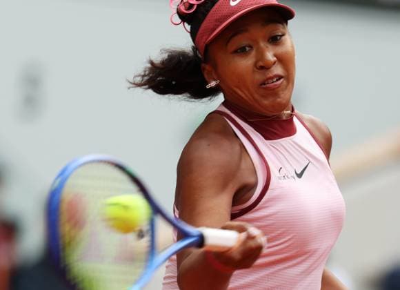 (250527) -- PARIS, May 27, 2025 -- Osaka Naomi hits a return during the women s singles first round match between Osaka Naomi of Japan and Paula Badosa of Spain at the French Open tennis tournament at Roland Garros, Paris, France, May 26, 2025. ) (SP)FRANCE-PARIS-TENNIS-FRENCH OPEN-WOMEN S SINGLES GaoxJing 