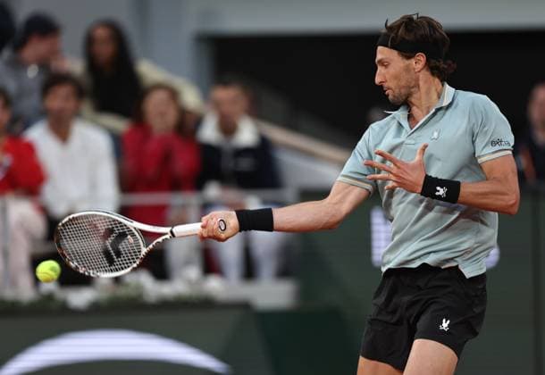 (250527) -- PARIS, May 27, 2025 -- Arthur Rinderknech returns a shot during the men s singles first round match between Jannik Sinner of Italy and Arthur Rinderknech of France at the French Open tennis tournament at Roland Garros, Paris, France, May 26, 2025. ) (SP)FRANCE-PARIS-TENNIS-FRENCH OPEN-MEN S SINGLES LixJing 