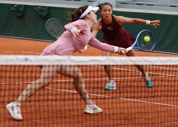 (250527) -- PARIS, May 27, 2025 -- Lulu Sun Yuan Yue (R) compete during the women s doubles first round match between Lulu Sun (New Zealand) Yuan Yue (China) and Anna Blinkova (Russia) Mayar Sherif (Egypt) at the French Open tennis tournament at Roland Garros, Paris, France, May 27, 2025. ) (SP)FRANCE-PARIS-TENNIS-FRENCH OPEN-WOMEN S DOUBLES GaoxJing 