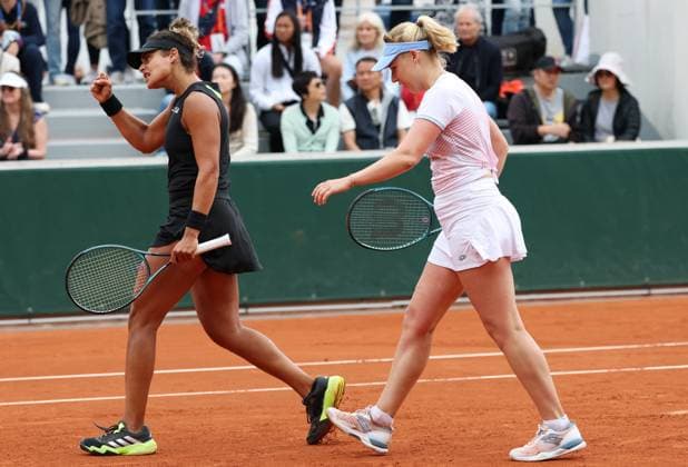 (250527) -- PARIS, May 27, 2025 -- Anna Blinkova Mayar Sherif (L) react during the women s doubles first round match between Lulu Sun (New Zealand) Yuan Yue (China) and Anna Blinkova (Russia) Mayar Sherif (Egypt) at the French Open tennis tournament at Roland Garros, Paris, France, May 27, 2025. ) (SP)FRANCE-PARIS-TENNIS-FRENCH OPEN-WOMEN S DOUBLES GaoxJing 