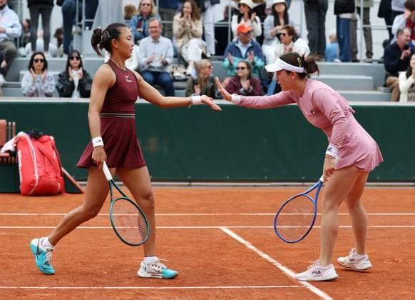 (250527) -- PARIS, May 27, 2025 -- Lulu Sun Yuan Yue (L) celebrate scoring during the women s doubles first round match between Lulu Sun (New Zealand) Yuan Yue (China) and Anna Blinkova (Russia) Mayar Sherif (Egypt) at the French Open tennis tournament at Roland Garros, Paris, France, May 27, 2025. ) (SP)FRANCE-PARIS-TENNIS-FRENCH OPEN-WOMEN S DOUBLES GaoxJing 