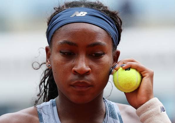 (250527) -- PARIS, May 27, 2025 -- Coco Gauff reacts during the women s singles first round match between Coco Gauff of the United States and Olivia Gadecki of Australia at the French Open tennis tournament at Roland Garros, Paris, France, May 27, 2025. ) (SP)FRANCE-PARIS-TENNIS-FRENCH OPEN-WOMEN S SINGLES GaoxJing 