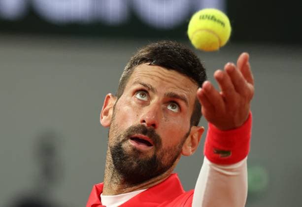 Novak Djokovic of Serbia plays against Mackenzie McDonald of the US during their first-round match at the French Tennis Open in Roland Garros in Paris, France, on Tuesday, May 27, 2025. Djokovic won 6-3, 6-3, 6-3.  PAR20250527301 MAYAxVIDON-WHITE