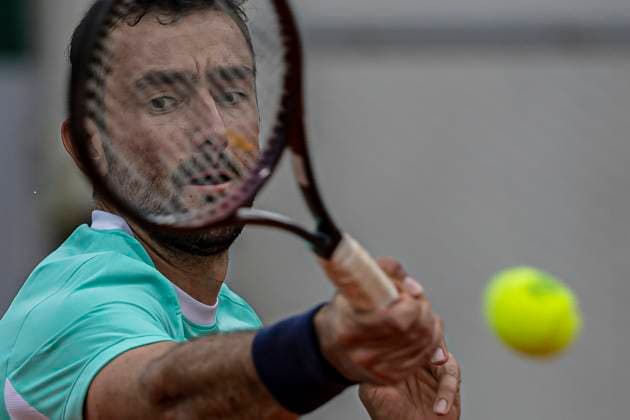 2025 French Open - Day Three Marin Cilic returns the ball against Flavio Cobolli at the Roland Garros Grand Slam Tournament in Paris, France, on May 27, 2025. Paris France  Copyright: xRobertxSzaniszlox originalFilename:szaniszlo-notitle250527_np66P.jpg