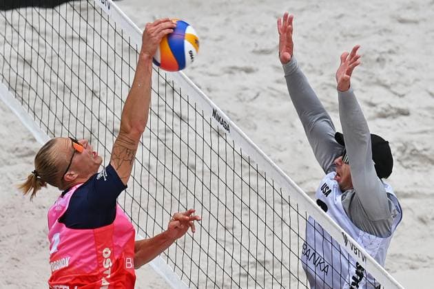 From left Matyas Dzavoronok of Czech Republic and Andrew Benesh of USA in action during the Groupe D men match Tadeas Trousil and Matyas Dzavoronok of Czech Republic vs Miles Partain and Andrew Benesh of USA at the Pro Tour Elite Beach volleyball, Beachvolleyball tournament in Ostrava, Czech Republic, May 29, 2025. (CTKxPhoto JaroslavxOzana) CTKPhotoP2025052903438  CTKPhotoP2025052903438