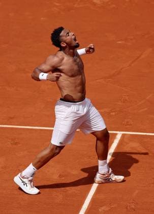 Arthur Fils of France celebrates ripping off his shirt following his win French Open Tennis, Day Five, Tennis, Roland Garros, Paris, France - 29 May 2025 EDITORIAL USE ONLY No use with unauthorised audio, video, data, fixture lists, club league logos or live services. Online in-match use limited to 120 images, no video emulation. No use in betting, games or single club league player publications.  Copyright: xEllaxLing Shutterstockx 15328391aq