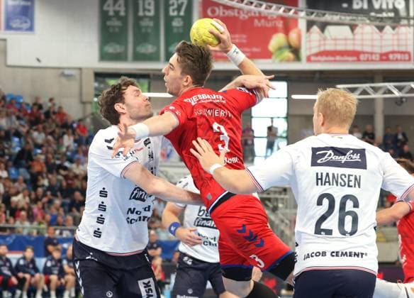 29 05 2025, Germany, Bietigheim, Handball 1 Bundesliga, SG BBM Bietigheim vs SG Flensburg Handewitt, f l Niclas Kirkelokke SG , Nikola Vlahovic BBM , Johan Hansen SG