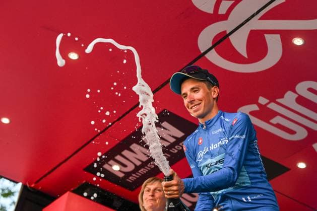 CICLISMO - Giro d Italia - Stage 18 - Morbegno-Cesano Maderno CESANO MADERNO, ITALY - MAY 29: XDS Astana Team s Italian rider Lorenzo Fortunato wearing the best climber s blue jersey (Maglia Azzura) celebrates on the podium after during the 108th Giro d Italia 2025, Stage 18 a 144km stage from Morbegno to Cesano Moderno 1.800m UCIWT on May 29, 2025 in Bormio, Italy. Credit: Tiziano Ballabio Cesaro Maderno Italy  Copyright: xIPAxSport ABACAx