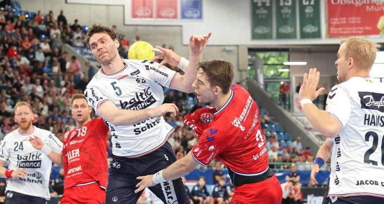 29 05 2025, Germany, Bietigheim, Handball 1 Bundesliga, SG BBM Bietigheim vs SG Flensburg Handewitt, f l Niclas Kirkelokke SG , Nikola Vlahovic BBM , Johan Hansen SG