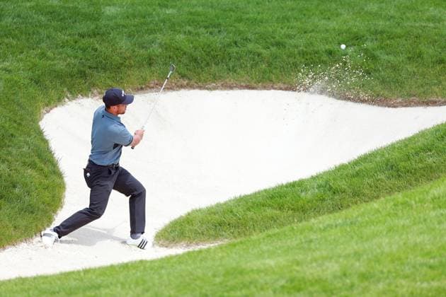 Memorial Tournament presented by Workday Xander Schauffele of the United States hits from the bunker to the 18th green during the first round of the Memorial Tournament presented by Workday at Muirfield Village Golf Club on May 29, 2025 in Dublin, Ohio. Dublin Ohio United States  Copyright: xAmyxLemusx originalFilename:lemus-memorial250529_npSfa.jpg