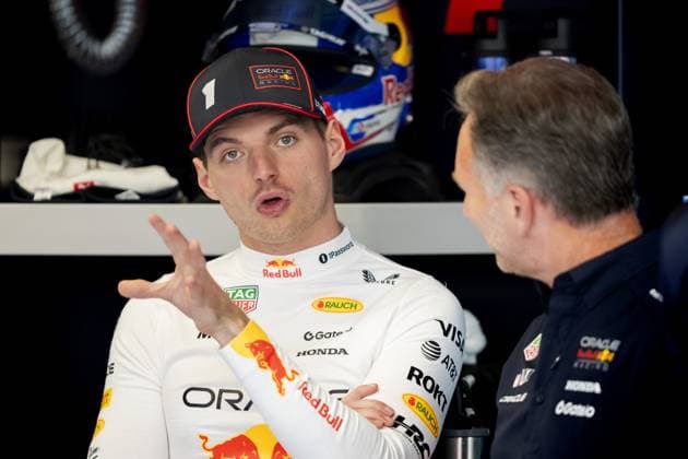 BARCELONA - Max Verstappen (Red Bull Racing) in conversation with Team boss Christian Horner prior to the first free practice session ahead of the Spanish Grand Prix. ANP SANDER KING xVIxANPxSportx xxANPxIVx 529001356 originalFilename: 529001356.jpg
