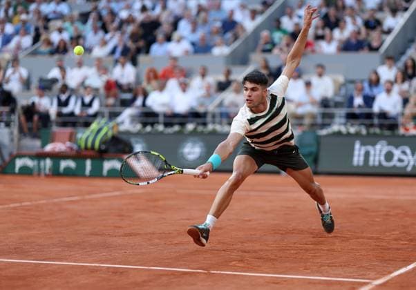 Carlos Alcaraz of Spain in action French Open Tennis, Day Six, Tennis, Roland Garros, Paris, France - 30 May 2025 EDITORIAL USE ONLY No use with unauthorised audio, video, data, fixture lists, club league logos or live services. Online in-match use limited to 120 images, no video emulation. No use in betting, games or single club league player publications. Copyright: xEllaxLing Shutterstockx 15330909bt
