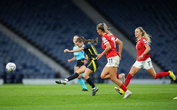 Kirsty Howat of Scotland Women shoots at goal under pressure from Marina Georgieva & Sarah Puntigam of Austria Women. Scotland Women v Austria Women, UEFA Women s Nations League - League A - Group 1, Football, Hampden Park, Glasgow, Scotland, UK - 30 May 2025 EDITORIAL USE ONLY No use with unauthorised audio, video, data, fixture lists, club league logos or live services. Online in-match use limited to 120 images, no video emulation. No use in betting, games or single club league player publications. Copyright: xStuartxWallace Shutterstockx 15330905bw