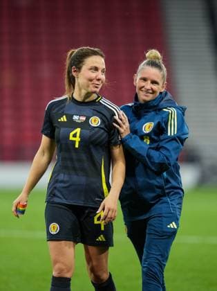 Rachel Corsie of Scotland Women with Leanne Ross as she walks off the pitch at full-time. Corsie recently announced her intention to retire and the Austria game was her last match. Final score Scotland W. 0 Austria W. 1. Scotland Women v Austria Women, UEFA Women s Nations League - League A - Group 1, Football, Hampden Park, Glasgow, Scotland, UK - 30 May 2025 EDITORIAL USE ONLY No use with unauthorised audio, video, data, fixture lists, club league logos or live services. Online in-match use limited to 120 images, no video emulation. No use in betting, games or single club league player publications. Copyright: xStuartxWallace Shutterstockx 15330905cj