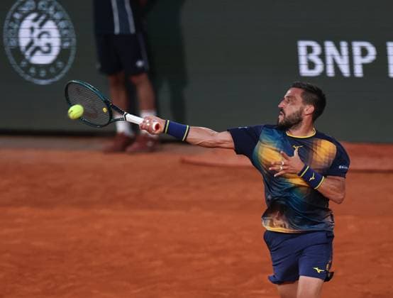 (250531) -- PARIS, May 31, 2025 -- Damir Dzumhur of Bosnia and Herzegovina returns the shot during the men s singles third round match against Carlos Alcaraz of Spain at the French Open tennis tournament at Roland Garros, Paris, France, May 30, 2025. ) (SP)FRANCE-PARIS-TENNIS-FRENCH OPEN-MEN S SINGLES LixJing 