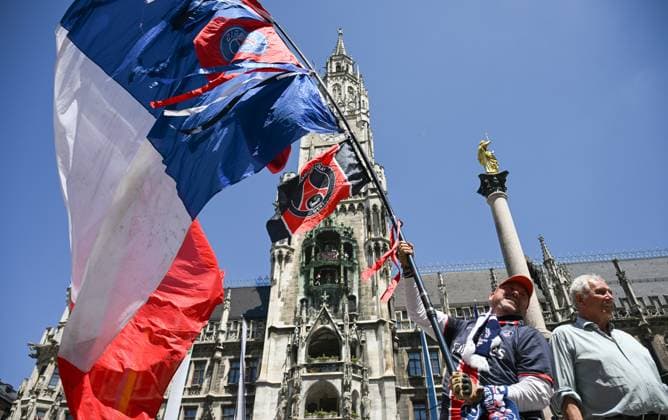 Germany Soccer Champions League Final Preview 8935835 31.05.2025 A Paris Saint-Germain s fan cheers at Marienplatz square as he prepares to watch the broadcast of the UEFA Champions League final soccer match between Paris Saint-Germain (PSG) and Inter Milan in Munich, Germany. Alexey Filippov Sputnik Munich Germany  Copyright: xAlexeyxFilippovx