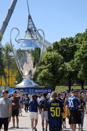 Champions League final football match between Internazionale Milano vs of FC Paris Saint-Germain Champions League Final Fan Village in Munich at the Olympic Park In the photo, fans playing while waiting to go to the stadium Munich Olimpic Park Bavaria Germania Copyright: xFABIOxSASSOxFabioxSassox 2L8A7387