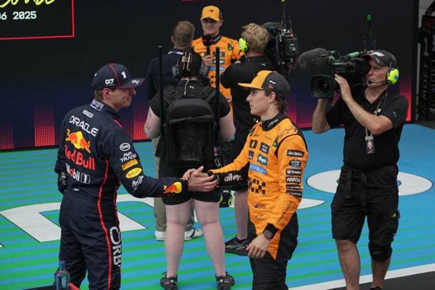 31 05 2025, Circuit de Catalunya, Barcelona, Formula 1 Aramco Spanish Grand Prix 2025 , pictured Max Verstappen NLD , Oracle Red Bull Racing congratulates Oscar Piastri AUS , McLaren F1 Team on pole position Photo by Hasan Bratic DeFodi Images