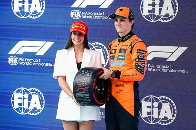 F1 - SPANISH GRAND PRIX 2025 PIASTRI Oscar (aus), McLaren F1 Team MCL39, portrait and Marta Garcia during the Formula 1 Aramco Gran Premio de Espana 2025, Spanish Grand Prix 2025, 9th round of the 2025 FIA Formula One World Championship, WM, Weltmeisterschaft from May 30 to June 1, 2025 on the Circuit de Barcelona-Catalunya, in Montmelo, Spain - MontmeloSpain  Copyright: xEricxAlonsox