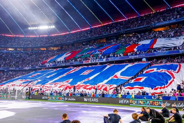 supporters of Paris Saint-Germain with banner Paris Saint-Germain v FC Internazionale Milano, UEFA Champions League Final 2025, Paris Saint-Germain and FC Internazionale Milano, Munich Football Arena, May 31, 2025, Munich, Germany.