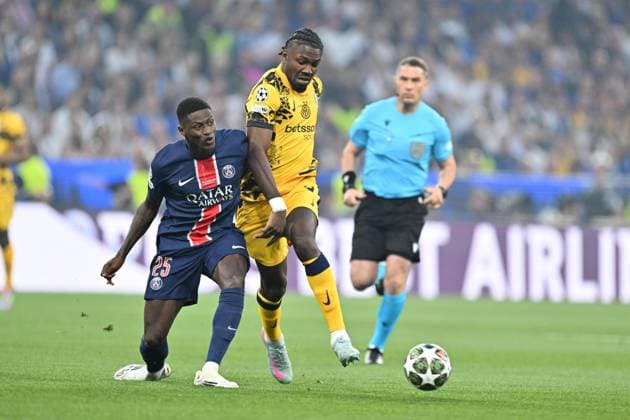 UEFA Champions League final match: Paris Saint-Germain v Inter Milan MUNICH, GERMANY - MAY 31: Nuno Mendes (L) of Paris Saint-Germain in action against Marcus Thuram (R) of Inter Milan during the UEFA Champions League final match between Paris Saint-Germain (PSG) and Inter Milan at Munich Football Arena in Munich, Germany on May 31, 2025. Mustafa Yalcin Anadolu Munich Germany. Editorial use only. Please get in touch for any other usage.  Copyright: x2025xAnadoluxMustafaxYalcinx