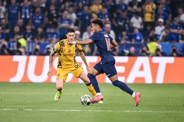 Alessandro Bastoni FC Internazionale Milano and Desire Doue Paris Saint Germain battle for the ball during the UEFA Champions League Final 2025 between Paris Saint Germain and FC Internazionale Milano at Munich Football Arena on May 31, 2025 in Munich, Germany Photo by Harry Langer DeFodi Images