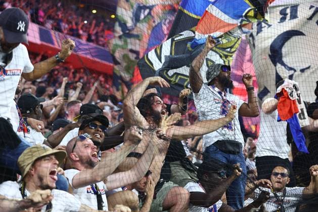 PSG fans celebrate the 1st goal Paris Saint-Germain v Inter Milan, UEFA Champions League Final, Football, Allianz Arena, Munich, Germany - 31 May 2025 EDITORIAL USE ONLY No use with unauthorised audio, video, data, fixture lists, club league logos or live services. Online in-match use limited to 120 images, no video emulation. No use in betting, games or single club league player publications. Copyright: xMichaelxZemanek Shutterstockx 15330931ap