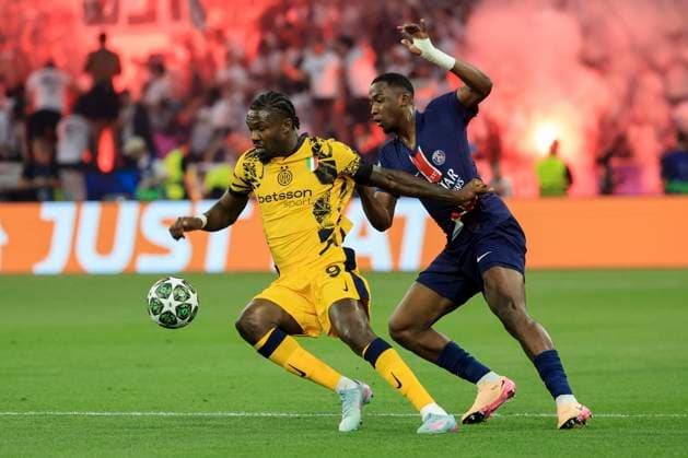 SOCCER - UEFA CL, PSG vs Inter MUNICH,GERMANY,31.MAY.25 - SOCCER - UEFA Champions League, final, Paris Saint-Germain vs FC Internazionale Milano. Image shows Marcus Thuram (Inter) and Willian Pacho (PSG).  GEPAxpictures xWolfgangxGrebien