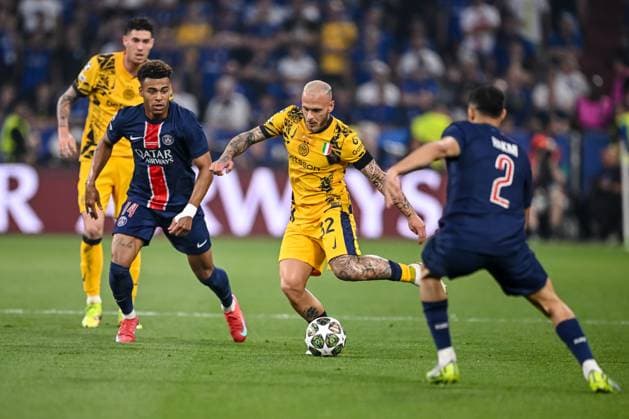 Desire Doue Paris Saint Germain , Federico Dimarco FC Internazionale Milano and Achraf Hakimi Paris Saint Germain battle for the ball during the UEFA Champions League Final 2025 between Paris Saint Germain and FC Internazionale Milano at Munich Football Arena on May 31, 2025 in Munich, Germany Photo by Harry Langer DeFodi Images
