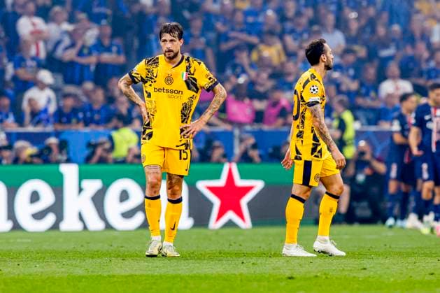 Francesco Acerbi of FC Internazionale and Hakan Ã‡alhanoÄülu of FC Internazionale looks dejected after conceding his sides second goal Paris Saint-Germain v FC Internazionale Milano, UEFA Champions League Final 2025, Paris Saint-Germain and FC Internazionale Milano, Munich Football Arena, May 31, 2025, Munich, Germany.