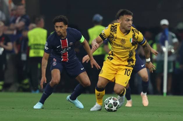 Lautaro Martinez (right) of Internazionale Milano is in action against Marquinhos of Paris Saint-Germain during the UEFA Champions League Final 2025 between Paris Saint-Germain and FC Internazionale Milano at the Munich Football Arena on May 31, 2025 in Munich, Germany. UEFA Champions League Final 2025 - Paris Saint-Germain v FC Internazionale Milano