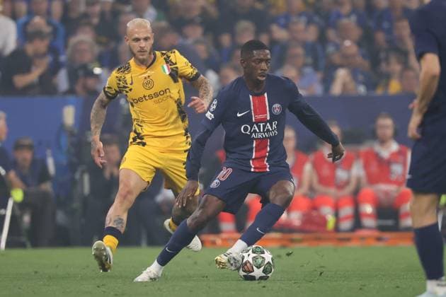 Dembele (right) of Paris Saint-Germain is in action against Federico Dimarco (left) of Internazionale Milano during the UEFA Champions League Final 2025 between Paris Saint-Germain and FC Internazionale Milano at the Munich Football Arena on May 31, 2025 in Munich, Germany. UEFA Champions League Final 2025 - Paris Saint-Germain v FC Internazionale Milano