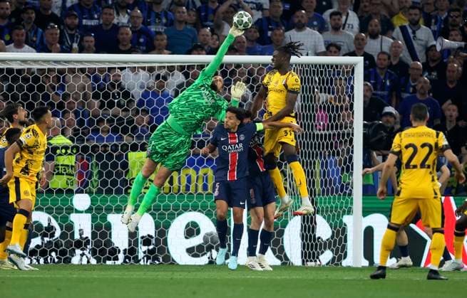 Paris Saint-Germain v FC Internazionale Milano - UEFA Champions League Final 2025 Gianluigi Donnarumma, goalkeeper of Paris Saint-Germain saves from Yann Aurel Bisseck of FC Internazionale Milano during the UEFA Champions League Final 2025 between Paris Saint-Germain and FC Internazionale Milano at Munich Football Arena on May 31, 2025 in Munich, Germany. Munich Munich Football Arena Germany Germany Copyright: xRichardxSellers Sportsphoto APLx 14127873
