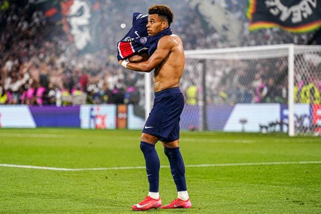2025-05-31 Paris Saint-Germain v FC Internazionale Milano - UEFA Champions League Final 2025 MUNICH, GERMANY - MAY 31: Desire Doue of Paris Saint-Germain puts his shirt back on after scoring the third goal during the UEFA Champions League Final 2025 match between Paris Saint-Germain and FC Internazionale Milano at Munich Football Arena on May 31, 2025 in Munich, Germany. Munich Munich Football Arena Germany Content not available for redistribution in The Netherlands directly or indirectly through any third parties. Copyright: xJorisxVerwijstx
