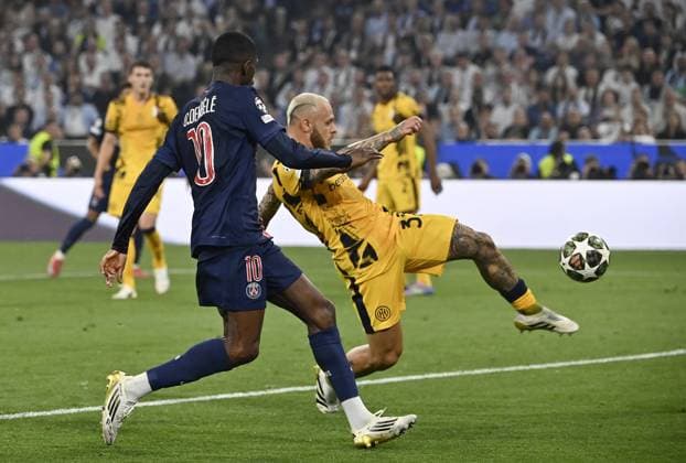 Paris Saint-Germain v Inter Milan UEFA Champions League final match MUNICH, GERMANY, MAY 31: Federico Dimarco (R), of Inter Milan, is challenged by Ousmane Dembele (L), of Paris Saint-Germain, during the UEFA Champions League football final match between Paris Saint-Germain and Inter Milan at the Munich Football Arena in Munich, Germany, on May 31, 2025. Isabella Bonotto Anadolu Munich Germany. Editorial use only. Please get in touch for any other usage.  Copyright: x2025xAnadoluxIsabellaxBonottox