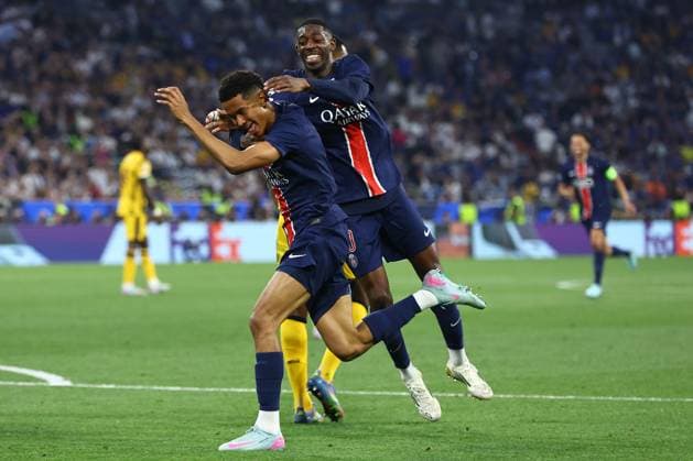 Senny Mayulu of PSG scores to make it 5-0 and celebrates Paris Saint-Germain v Inter Milan, UEFA Champions League Final, Football, Allianz Arena, Munich, Germany - 31 May 2025 EDITORIAL USE ONLY No use with unauthorised audio, video, data, fixture lists, club league logos or live services. Online in-match use limited to 120 images, no video emulation. No use in betting, games or single club league player publications. Copyright: xMichaelxZemanek Shutterstockx 15330931dk