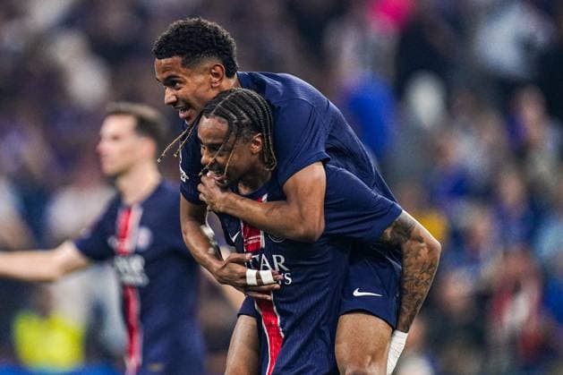 2025-05-31 Paris Saint-Germain v FC Internazionale Milano - UEFA Champions League Final 2025 MUNICH, GERMANY - MAY 31: Bradley Barcola of Paris Saint-Germain, Senny Mayulu of Paris Saint-Germain celebrate winning the UEFA Champions League during the UEFA Champions League Final 2025 match between Paris Saint-Germain and FC Internazionale Milano at Munich Football Arena on May 31, 2025 in Munich, Germany. Munich Munich Football Arena Germany Content not available for redistribution in The Netherlands directly or indirectly through any third parties. Copyright: xJorisxVerwijstx