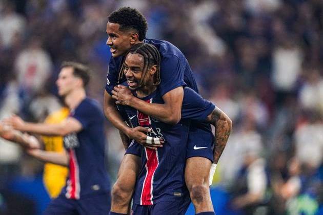 2025-05-31 Paris Saint-Germain v FC Internazionale Milano - UEFA Champions League Final 2025 MUNICH, GERMANY - MAY 31: Bradley Barcola of Paris Saint-Germain, Senny Mayulu of Paris Saint-Germain celebrate winning the UEFA Champions League during the UEFA Champions League Final 2025 match between Paris Saint-Germain and FC Internazionale Milano at Munich Football Arena on May 31, 2025 in Munich, Germany. Munich Munich Football Arena Germany Content not available for redistribution in The Netherlands directly or indirectly through any third parties. Copyright: xJorisxVerwijstx