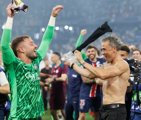 Paris Saint-Germain v FC Internazionale Milano - UEFA Champions League Final 2025 Gianluigi Donnarumma, goalkeeper of Paris Saint-Germain and Luis Enrique, head coach of Paris Saint-Germain celebrates after winning the UEFA Champions League Final 2025 between Paris Saint-Germain and FC Internazionale Milano at Munich Football Arena on May 31, 2025 in Munich, Germany. Munich Munich Football Arena Germany Germany Copyright: xRichardxSellers Sportsphoto APLx 14127910