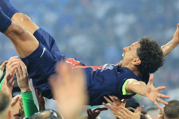 31st May 2025; Allianz Arena, Munich, Germany; Champions League Final Football, Paris Saint Germain versus Inter Milan; Marquinhos (C) of PSG is tossed in the air by his team mates in celebration  ActionPlus12796878 PierrexTeyssot