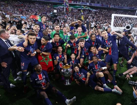 Munich, Germany, 31st May 2025. Paris Saint Germain celebrate with the trophy during the Paris Saint Germain vs Internazionale UEFA Champions League Final match at Munich Football Arena, Munich. Picture credit should read: David Klein Sportimage EDITORIAL USE ONLY. No use with unauthorised audio, video, data, fixture lists, club league logos or live services. Online in-match use limited to 120 images, no video emulation. No use in betting, games or single club league player publications. SPI_141_DK_UCL_Final SPI-3964-0144