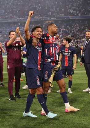 Munich, Germany, 31st May 2025. Marquinhos and Presnel Kimpembe of Paris St Germain celebrate the win during the Paris Saint Germain vs Internazionale UEFA Champions League Final match at Munich Football Arena, Munich. Picture credit should read: David Klein Sportimage EDITORIAL USE ONLY. No use with unauthorised audio, video, data, fixture lists, club league logos or live services. Online in-match use limited to 120 images, no video emulation. No use in betting, games or single club league player publications. SPI_142_DK_UCL_Final SPI-3964-0145