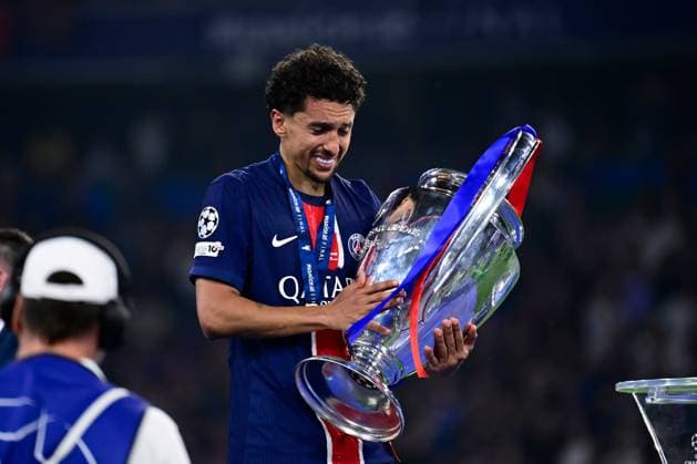 FOOTBALL : PSG vs Inter - Finale Ligue des Champions - 31 05 2025 Marquinhos ( 5 - PSG ) celebrates with Champions League Cup on hands during the UEFA Champions League Final match between Paris Saint Germain and FC Internazionale Milano at Munich Football Arena on May 31 , 2025 in Munich, Germany. ( Photo by Dante Badano PsnewZ ) - MunichGermany  Copyright: xx